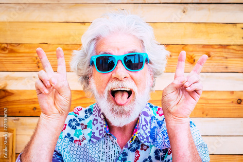 Crazy And Happy Active Young And Youth Senior Man Making Fun