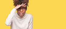 Beautiful Young African American Woman Wearing Glasses Over Isolated Background Very Happy And Smiling Looking Far Away With Hand Over Head. Searching Concept.
