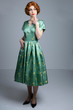 © Kathy - 1950's woman in green satin dress