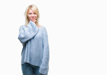 Sticker - Young beautiful blonde woman wearing winter sweater over isolated background looking confident at the camera with smile with crossed arms and hand raised on chin. Thinking positive.