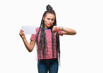 Sticker - Young african american girl holding blank card over isolated background with angry face, negative sign showing dislike with thumbs down, rejection concept