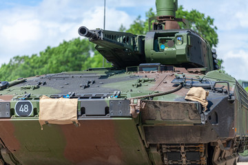 Wall Mural - German infantry fighting vehicle drives on a street