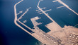 Aerial view of oil refinery and tankers loading along the coast of Qatar.