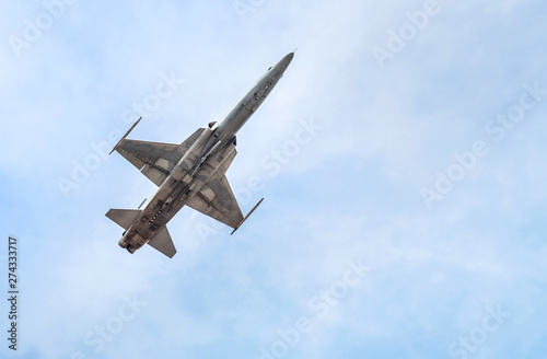 Tela fighter jet military aircrafts flying with high speed on blue sky