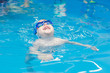 © DmitryDolgikh - little boy learns to swim in the pool