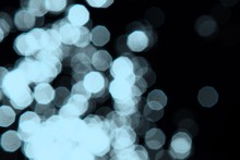 Light Blue Bokeh Effect Of Glossy Spots On Black Texture - Fantastic Abstract Photo Background