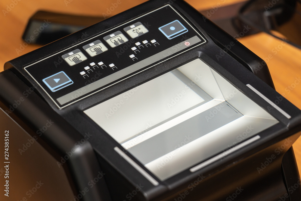 Devices for scanning passport documents, fingerprinting during border ...