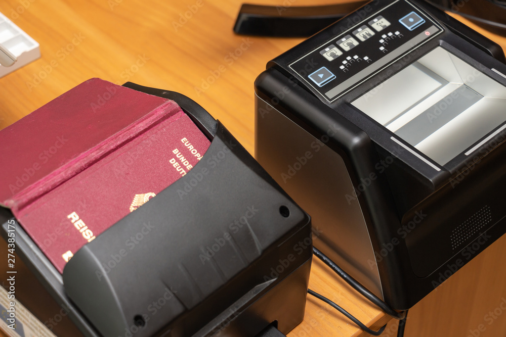 Devices for scanning passport documents, fingerprinting during border ...