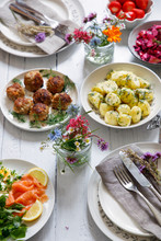 Scandinavian Midsummer Feast With Potato Salad, Meatballs, Salmon And Beetroot