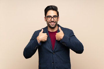 Handsome young man over isolated background with surprise facial expression