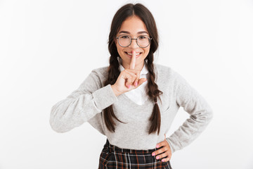 Sticker - Photo closeup of lovely teenage girl wearing eyeglasses smiling while holding finger at her mouth