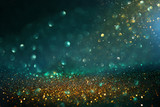 Fototapeta  - abstract glitter lights background. black, blue, gold and green. de-focused