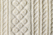 Abstract Textured Background Of Close Up Detail Of Knitting In A Handmade Sweater