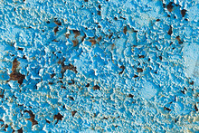 Rusty Metal Surface Painted With Peeling Blue Paint