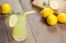 Lemonade In Glass.Homemade Refreshment Summer Cold Drink With Fresh Lemons And Mint. Lemon Mojito Cocktail With Juice