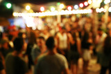 Fototapeta  - Blurred background of many people had fun at a beach party. Festive concept.