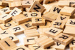 Heap of scrabble tile letters from above