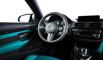 Modern luxury car Interior - steering wheel, shift lever and dashboard. Car interior luxury inside. Steering wheel, dashboard, speedometer, display. Cyan blue leather cockpit