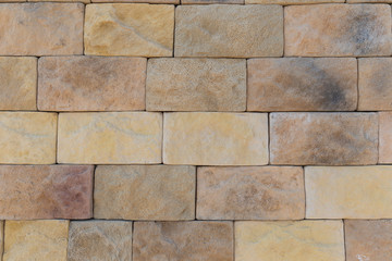 The texture of the wall of a variety of colored stones