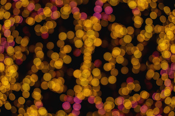 Wall Mural - Small abstract blurred and bokeh of reflection lighting of led light bubs on black background.