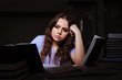 © Elnur - Young female student preparing for exams late at home
