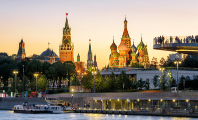 Wall Mural - Moscow Kremlin and St Basil`s Cathedral at sunset, Russia. Zaryadye Park on embankment of Moskva River. Beautiful panorama of the Moscow city center at night.