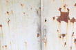 © supersomik - Bright rust stains texture paint showing through to rust underneath