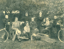 Family Photo, Family And Nine Children Posing In The Background Of The Garden With Two Bicycles Xylophone