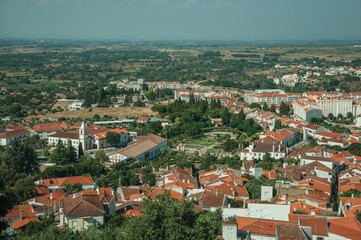 City landscape with old building roofs and church steeple