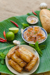 Poster - Vietnamese food background with spring roll, banh mi, banh canh, steamed fish ball, shrimp dumpling. Typical cuisine of south central of Vietnam like Binh Thuan, Ninh Thuan, Nha Trang province