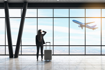 Poster - Businesswoman in airport