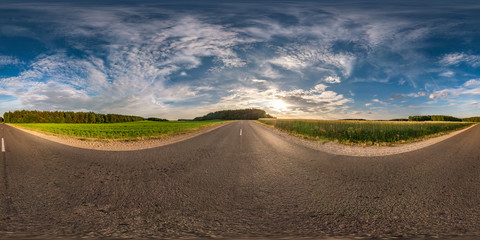 Wall Mural - spherical hdri panorama 360 degrees angle view on asphalt road among fields in summer evening sunset with awesome clouds in equirectangular projection, ready VR AR virtual reality content