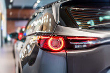 Modern Car Led Tail Lights In Showroom