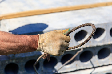 Installing concrete slabs at a construction site at home