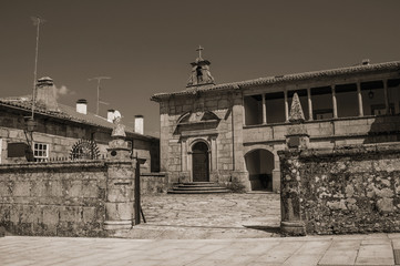 Wall Mural - Old stone building on cobblestone alley