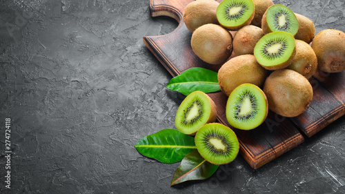 Fresh Kiwi on a black background Poster Mural XXL