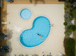 Aerial drone picture about a beautiful, blue, outdoor swimming pool with playing children.
