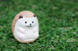 © travelers.high - Sitting Hedgehog ornament on lawn