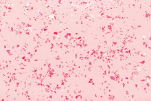 Glitter Mica. Red Sparkles On Pink Pastel Trendy Background. Festive Abstract Backdrop With Confetti. Flat Lay.