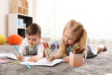 Wall Mural - Little children drawing indoors. Learning and playing