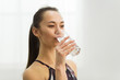 © Prostock-studio - Healthy Lifestyle. Young Woman Drinking Fresh Water