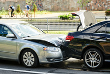 Car Crash Accident On Street. Damaged Automobiles