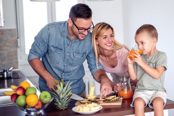 Wall Mural - Young family in the kitchen