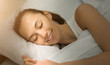 © Prostock-studio - Good Dream. Smiling Girl Sleeping In Bed