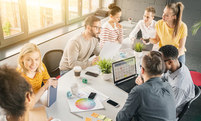 Wall Mural - Young creative business people meeting at office.