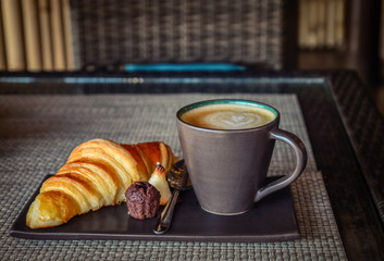 Wall Mural - Coffee latte with croissant