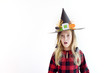 © Anastasiia - The girl in a carnival costume of the witch for Halloween. Hat of the witch.