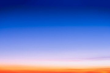 Wall Mural - sunrise in the sky with blue and orange natural background.