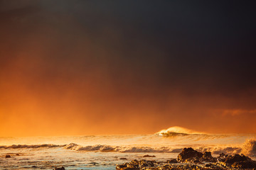 Canvas Print - Waves and Rocks at Beach at Sunrise