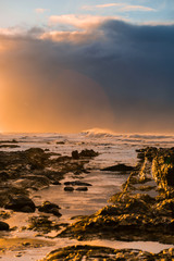 Canvas Print - Waves and Rocks at Beach at Sunrise